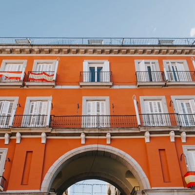 front of an older orange building